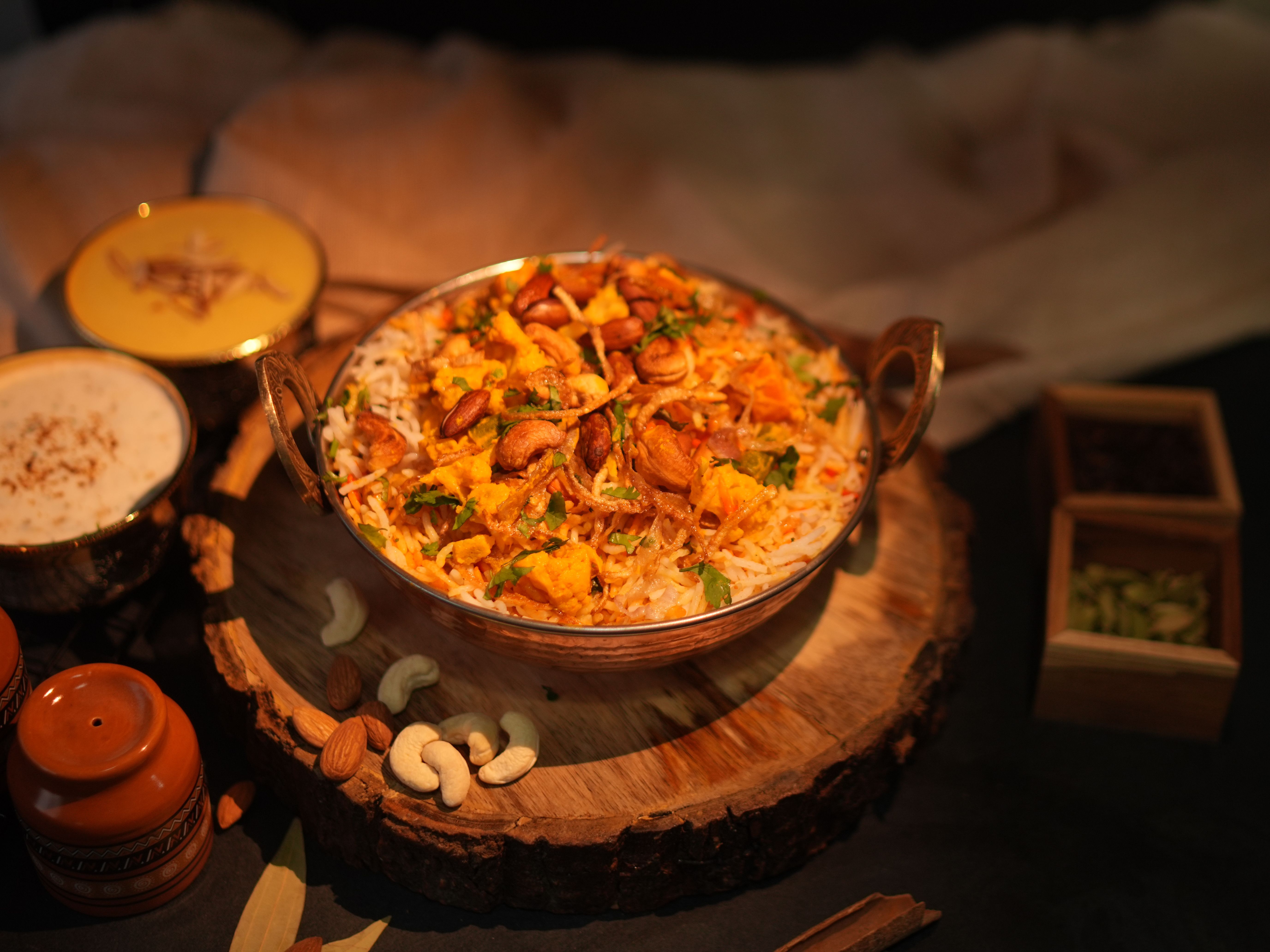 Steaming veg dum biryani fresh from the handi, layered with rice and spices